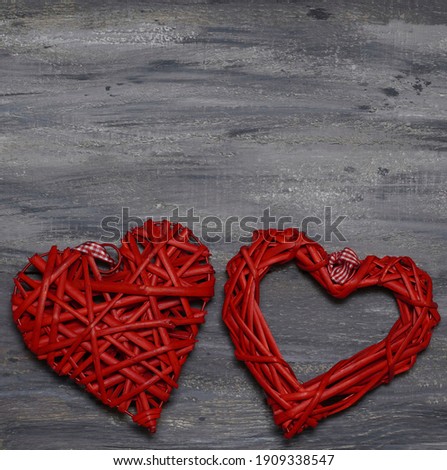  Red shape two handmade hearts on an old vintage wooden grey background. Happy Valentines Day background. Love concept. Top view. Copyspace for text. Banner.                                           