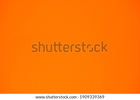 surface of orange paper for background. Royalty-Free Stock Photo #1909339369