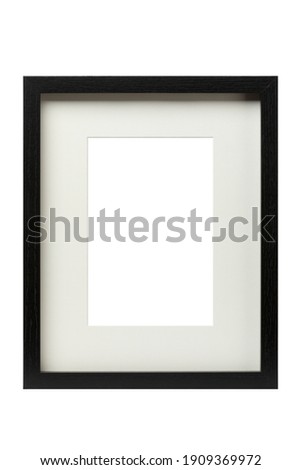 Vertical black wooden picture frame with matte, isolated with clipping path on white background. Template for artwork with 2:3 aspect ratio