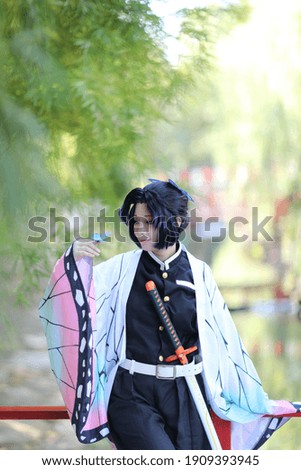 portrait of a girl with comic costume in japanese theme garden