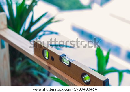 Water level on a wooden plank. DIY and constructions concept.