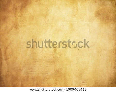 Grunge style paper background with stains and creases