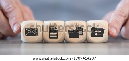Concept of data exchange with icons on wooden cubes