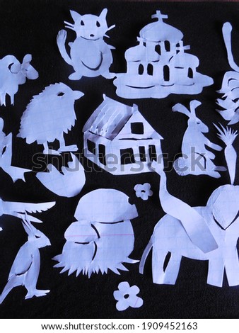 Homemade stencils, easily made with children, cut out of unnecessary paper. For applying different patterns (animals, butterflies, flowers, mushrooms, houses) on Easter eggs.