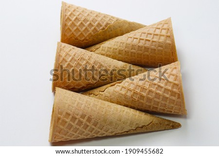 tasty ice cream cone stock on gray background
