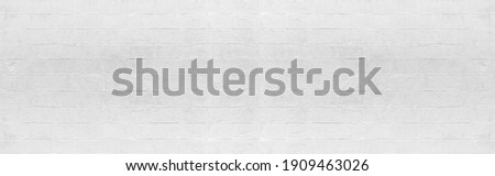 Panorama of White cement block fence texture and seamless background Royalty-Free Stock Photo #1909463026
