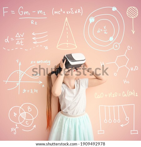 Little girl with virtual reality glasses studying exact mathematical sciences. Concept of online education