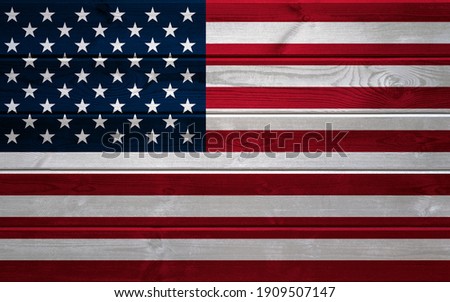 USA flag on a wooden surface.