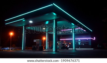 car gas station neon light Royalty-Free Stock Photo #1909676371