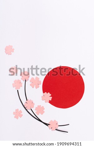 Red sun and pink flowers isolated on white background. Paper design for Japan National Foundation day.