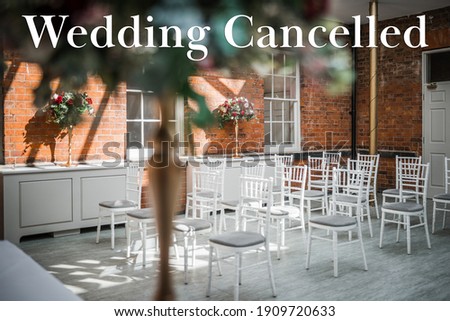 Wedding cancelled due to Covid 19 pandemic lockdown restrictions red writing text and picture of marriage ceremony room behind with empty chairs and no guests just flowers and seats