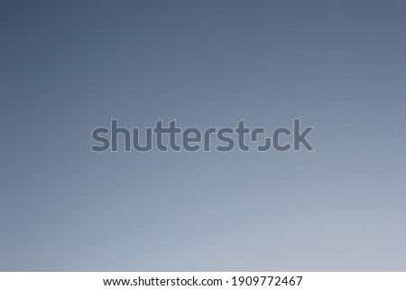 Clear light blue sky texture without clouds, morning winter background
