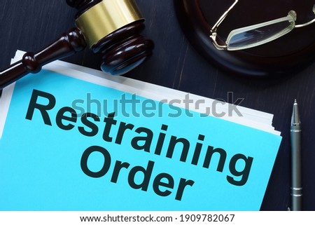 Restraining Order is shown on the conceptual photo Royalty-Free Stock Photo #1909782067