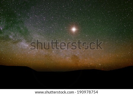 Nativity scene backdrop with the Christmas star and the real night sky.
