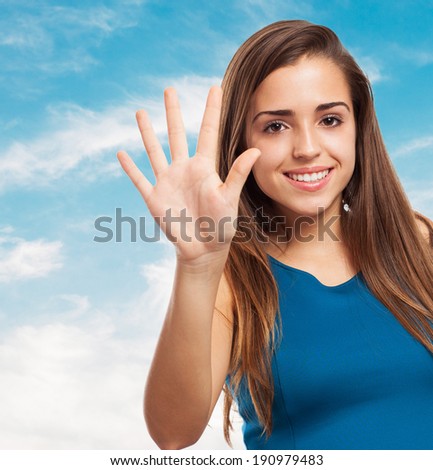 portrait of an elegant young girl counting with her fingers