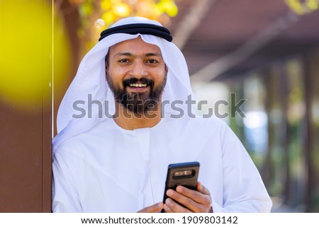 Middle Eastern Arab Emirati Vlogger Royalty-Free Stock Photo #1909803142