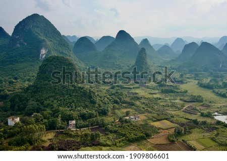 Sunset landscape of Guilin, Li River and Karst mountains. Located near Yangshuo County, Guilin City, Guangxi Province, China. Royalty-Free Stock Photo #1909806601