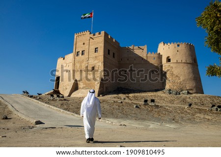 Middle Eastern ArabEmirati man exploring Fujairah Fort Royalty-Free Stock Photo #1909810495