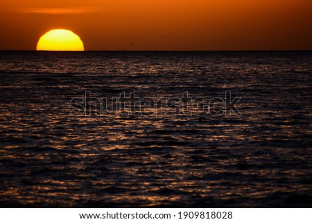 Photo Picture of The  Sun Setting in the Sea