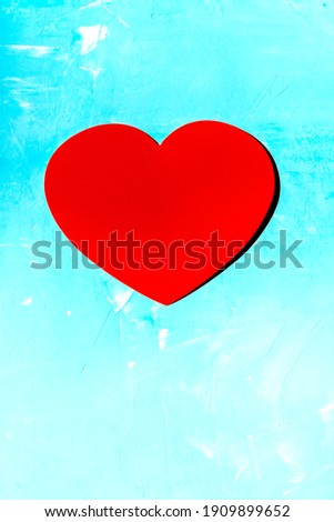 Valentine's Day background  with Red  heart on blue  background.  14 February special day for couples in love
