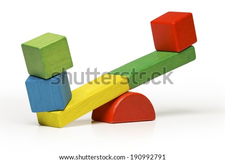 toys seesaw wooden blocks, teeter totter isolated on white background balance weight cube, swing  with heavy and light idea 