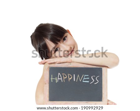 Young caucasian girl holding chalkboard signed happiness isolated on white