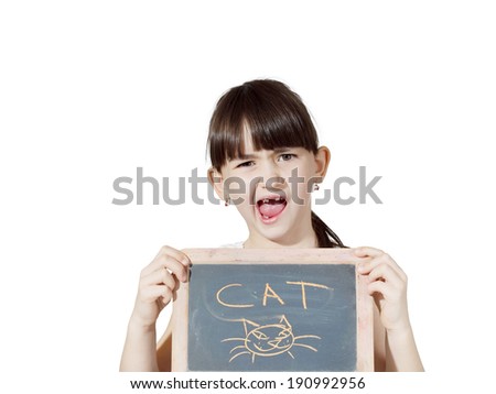 Young caucasian girl holding chalkboard signed cat isolated on white