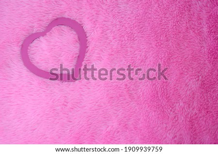 Pink heart on gradient  pink skin background with copy space. San Valentine's day or Mother's day. Love celebration.