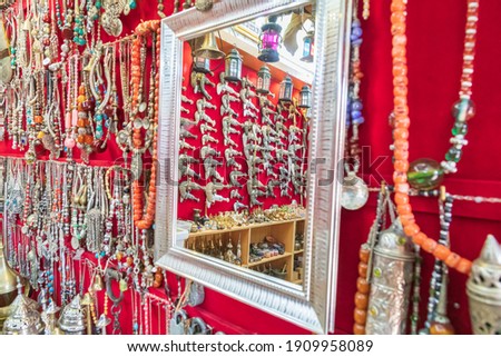 Middle East, Arabian Peninsula, Oman, Ad Dakhiliyah, Nizwa. Khanjar knives and jewelry for sale in the souk in Nizwa, Oman.