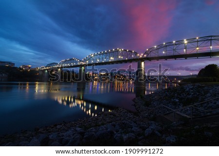 colored sunset picture of Tennessee River and walnut st bridge in Chattanooga