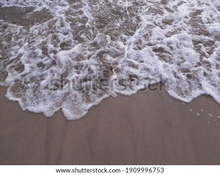 foam waves on the beach