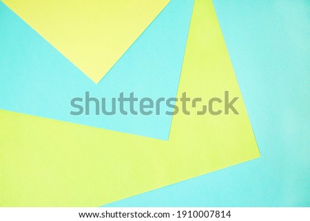  Geometric composition from colored paper. Multicolored sheets of paper background with copy space for design.                              