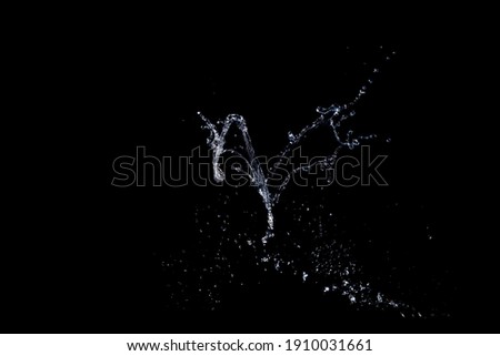 water splash isolated on black background.