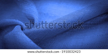 Blue fabric, dark sapphire silk, bright sunny abstract background illustration. Decorative items close-up. Wallpaper texture, background