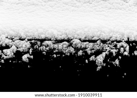 white snow isolated on a black background. Winter elements for design. High quality photo