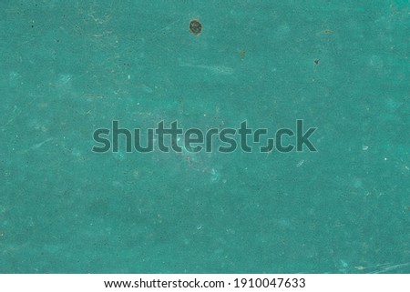 Texture of old turquoise paint on metal