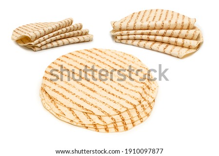 Grilled pitta bread isolated on white background. Top view. 