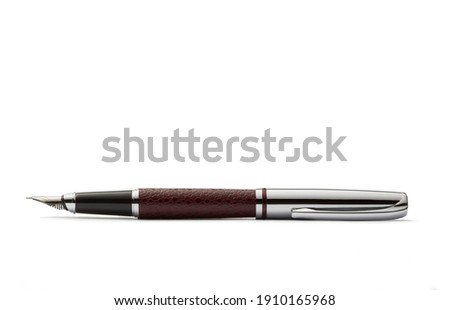 Close-up picture of ballpoint pen over white background. Royalty-Free Stock Photo #1910165968