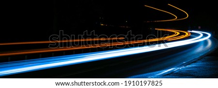 orange and blue car lights at night