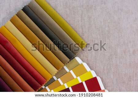 Multi Color guide palette with fabric samples. Repair concept
