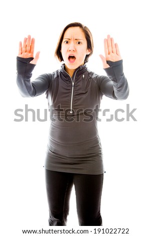 Young woman making stop gesture sign
