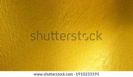 Gold metal brushed background or texture of brushed steel Royalty-Free Stock Photo #1910233195