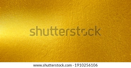Gold metal brushed background or texture of brushed steel Royalty-Free Stock Photo #1910256106