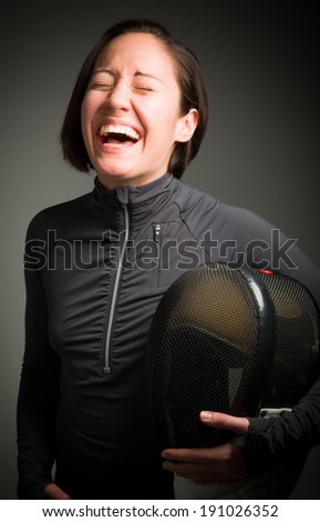 Female fencer laughing