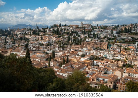 Aerial view of medieval old city of Granada, Spain with beautiful sky