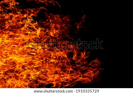 Orange flame on black background