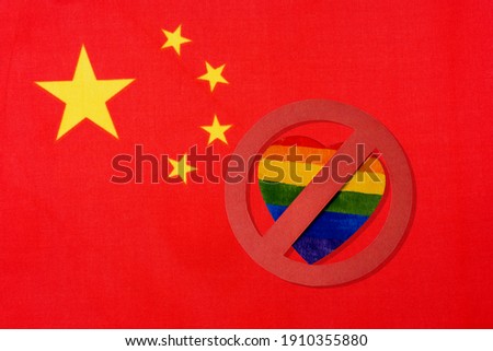the flag of China and the ban on LGBT people. Crossed out red circle of the heart in the form of the Lgbt flag.