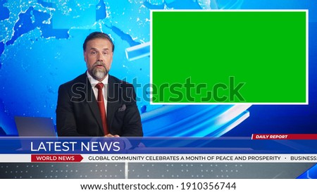 Live News Studio with Handsome Male Anchor Reporting on a Story, Uses Green Chroma Key Screen Placeholder Copy Space. Television Newsroom Channel with Professional Presenter