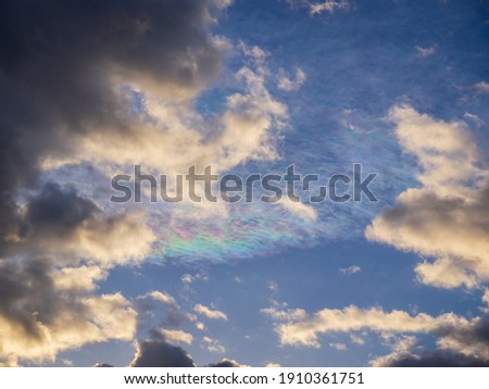iridescent clouds that appeared under the blue sky