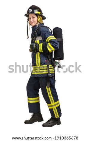 Full body young caucasian woman in uniform of fireman goes away in profile with Air Cylinder Assembly on her back isolated on white background 